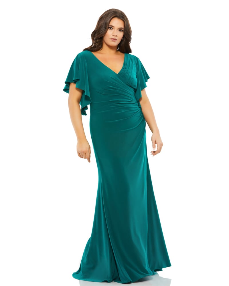 Front of a model wearing a size 14W Faux Wrap Butterfly Sleeve Gown in Emerald Green by Mac Duggal. | dia_product_style_image_id:289818